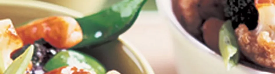 Roergebakken broccoli en bloemkool met garnalen