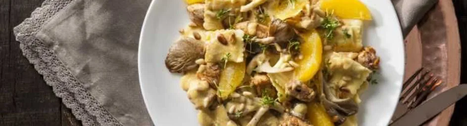 Pasta met sinaasappel en kip