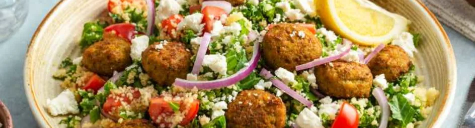 Couscous salade met boerenkool en tomaat