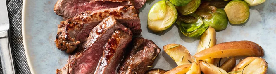 Ossenhaas met gebakken spruitjes en cranberry jus