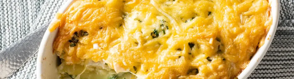 Aardappelgratin met bieslook en geraspte kaas