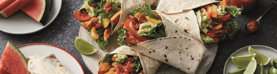 Frisse kipfajita met paprika en guacamole