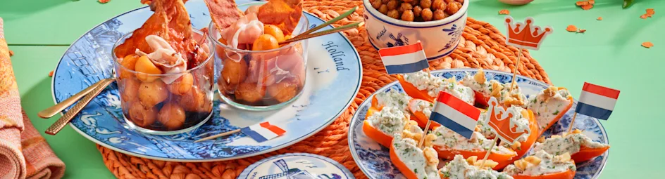 Oranje meloen hapje met rauwe ham