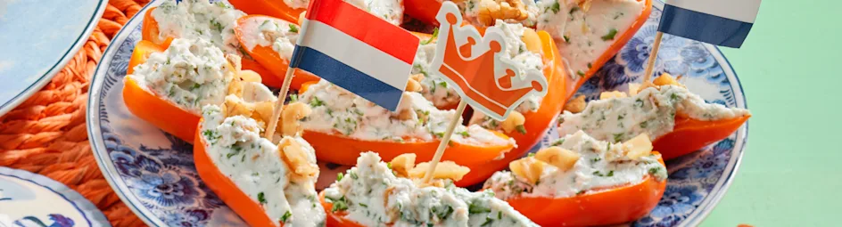 Oranje snackpaprika's met geitenkaas