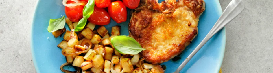 Ribkarbonade met gebakken tomatensalade