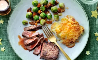 Biefstuk met aardappelgratin en spruiten