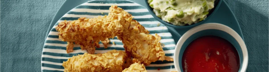 Crunchy vissticks met erwten-aardappelpuree