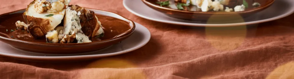 Geroosterde knolselderij met blauwaderkaas en walnoten