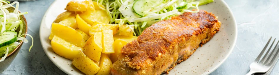 Krokante zalmfilet met knoflook-aardappeltjes