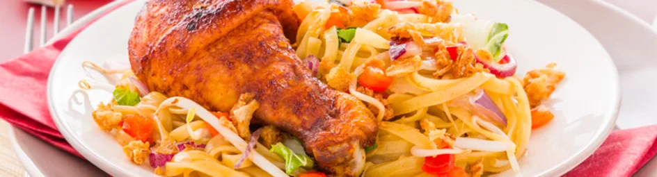 Pikante kip drumsticks met roerbakgroenten