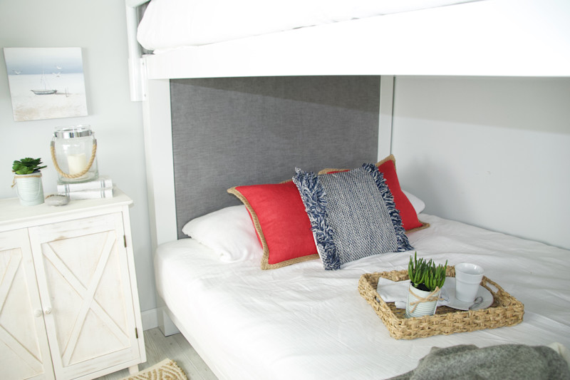 Upholstered Headboard on White Queen Bunk