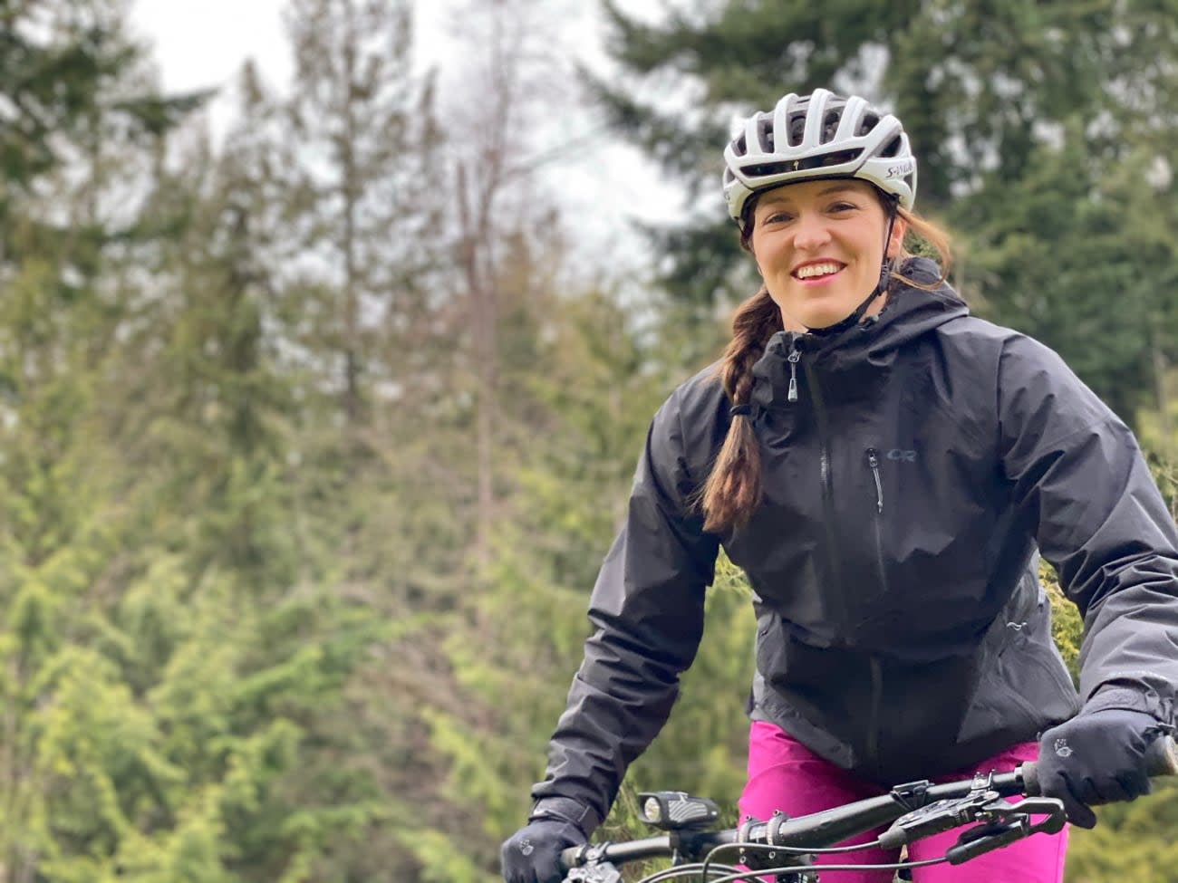 Photo of Marcy Sutton mountain biking.