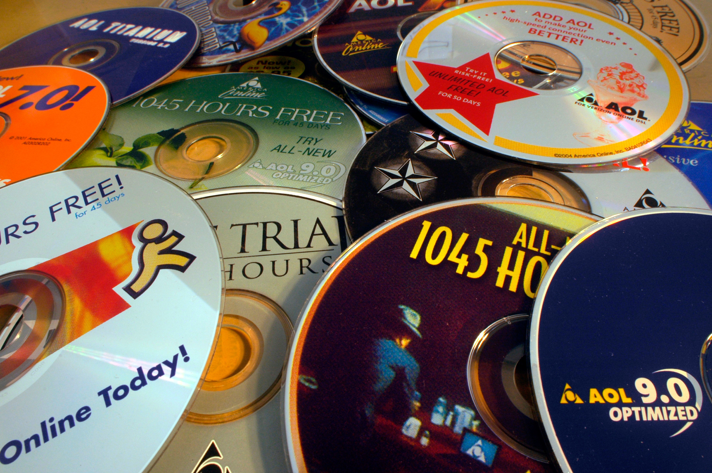 A pile of various AOL software CDs