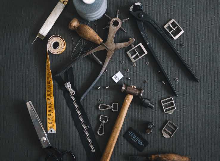 Building tools such as hammer, nails and tape measure