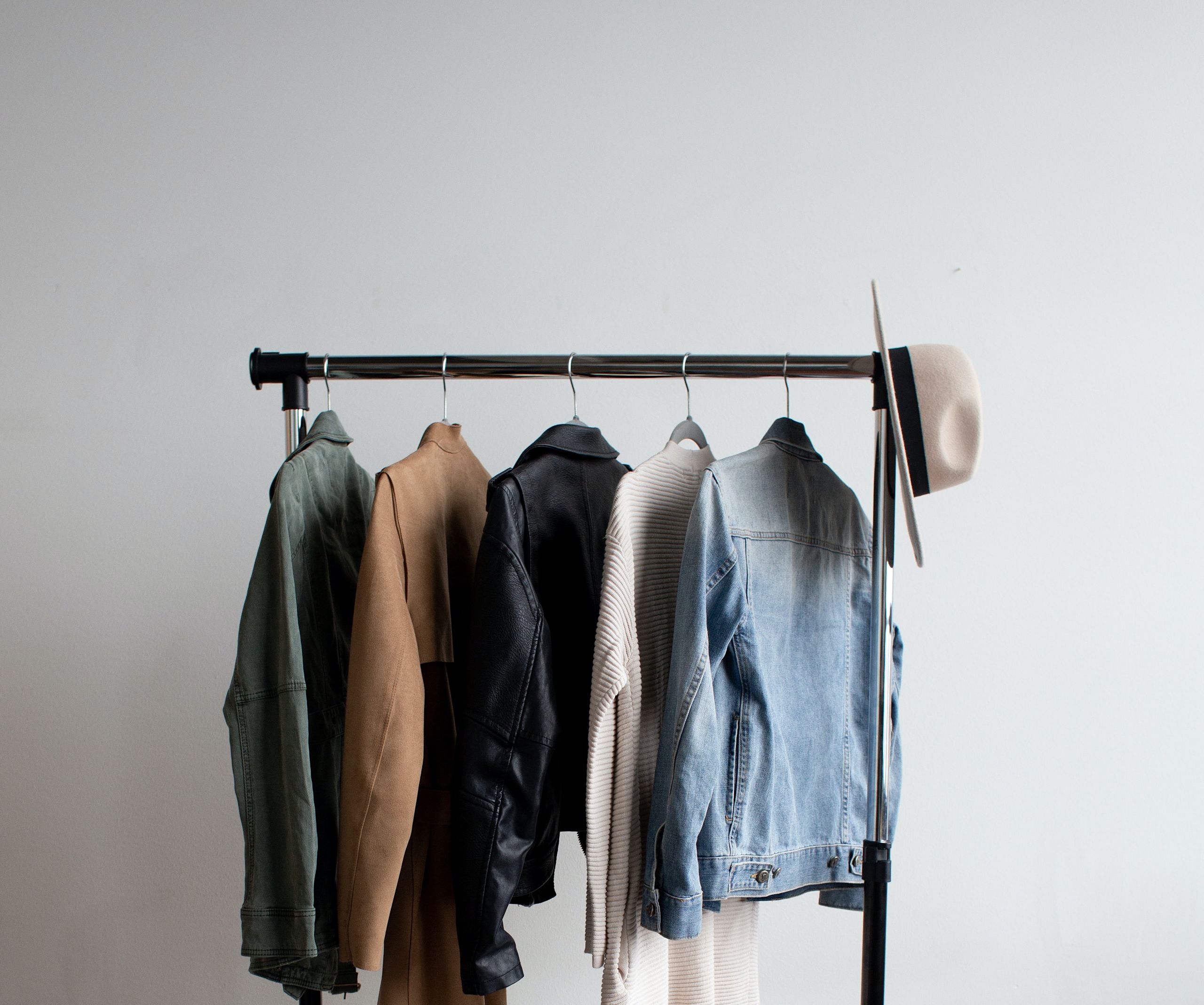 Stylish clothes on a rack