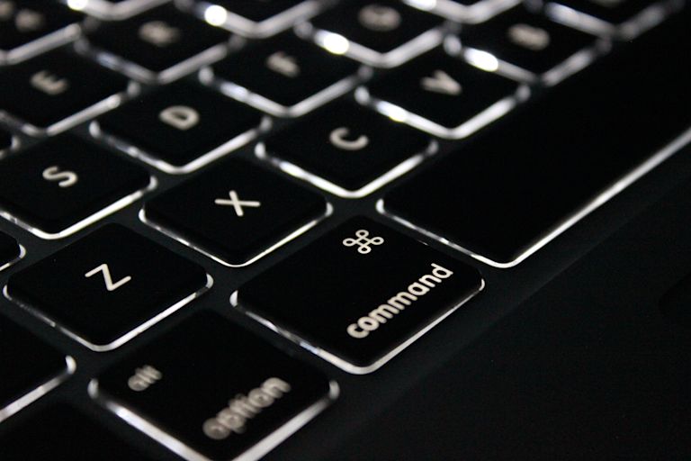 Picture of the command key on a laptop