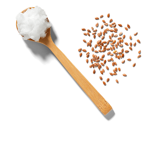 Bamboo spoon with coconut oil and flaxseeds