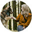 Annika and dog sitting on a log
