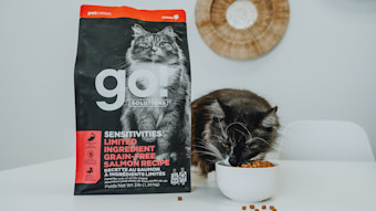 Cat eating Go! Solutions Sensitivities kibble from bowl