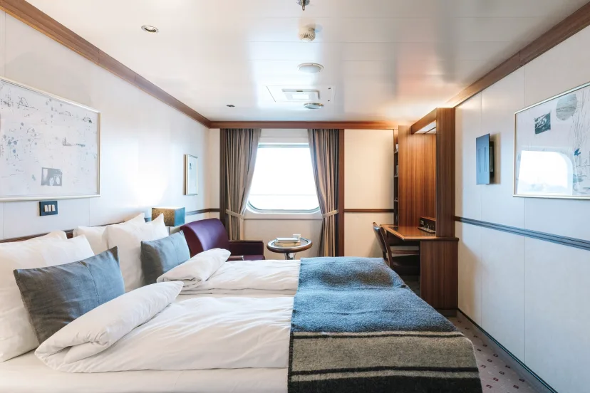 Bedroom in an Outside cabin | With limited view (F) onboard MS Fram. Credit: Clara Tuma