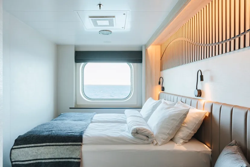 Bedroom in an Outside cabin (U) onboard MS Fram. Credit: Clara Tuma