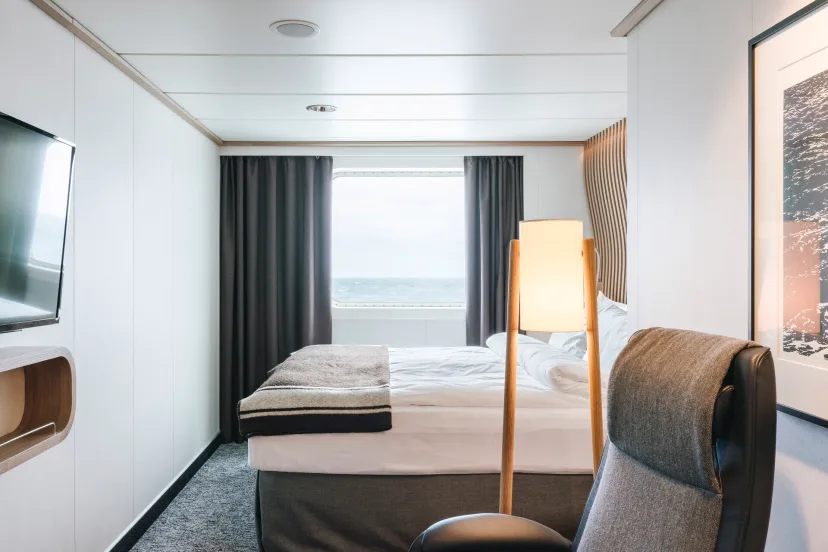 Bedroom in a Polar Outside cabin (RR) onboard MS Fridtjof Nansen. Credit: Clara Tuma