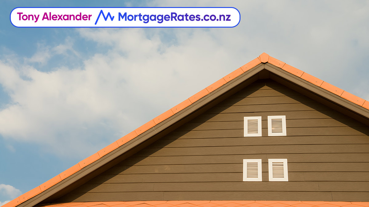 Top of a brown house with orange roof