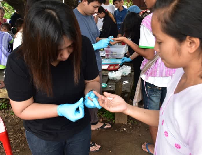 Collecting blood samples at a field lab