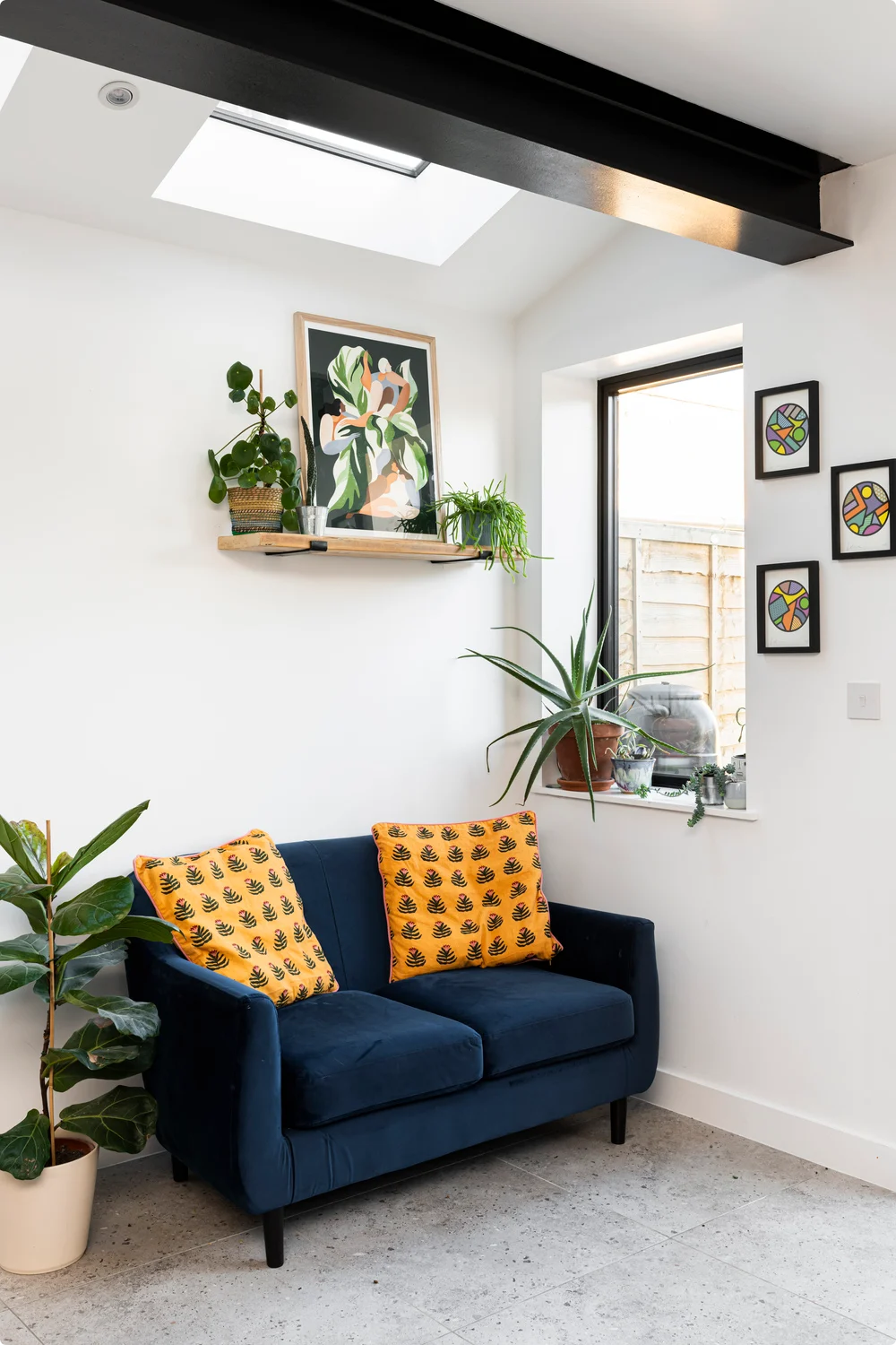 Indoor plants and plenty of natural light make for a calm aesthetic 