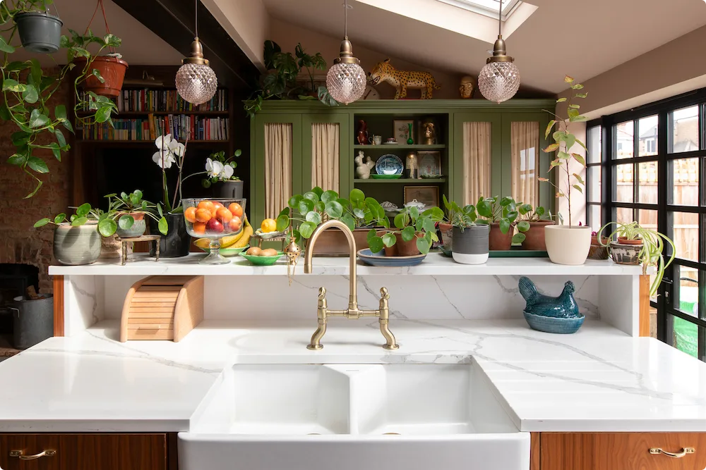A lesson in the art of lighting for your kitchen party, exemplified in this Forest Hill project