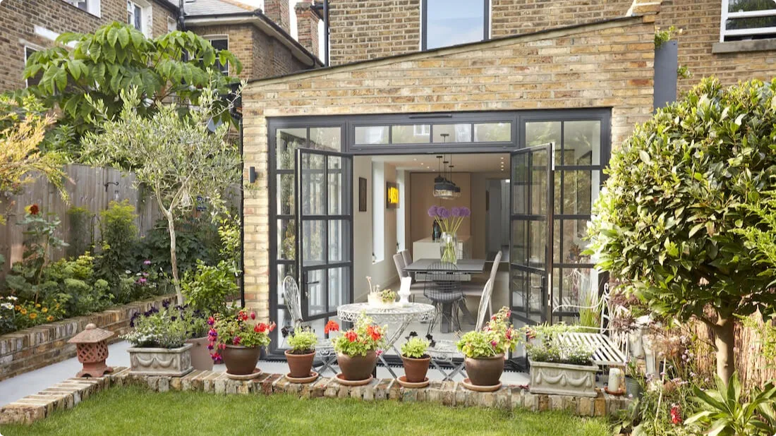A pitched roof wraparound extension in London from 2020.