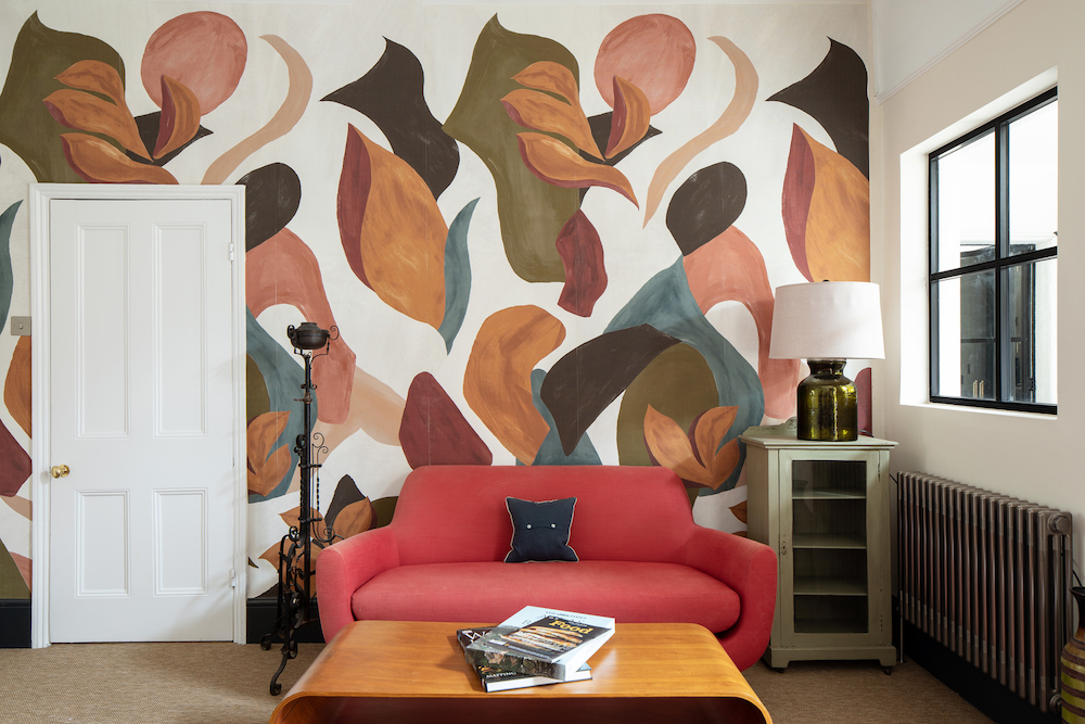 A beautiful indoor painted mural design at a completed Resi project
