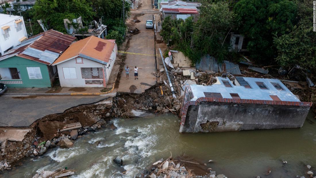 A destroyed road and home are seen in Guayama, Puerto Rico, days after Hurricane Fiona dropped over 20 inches of rain on the island.