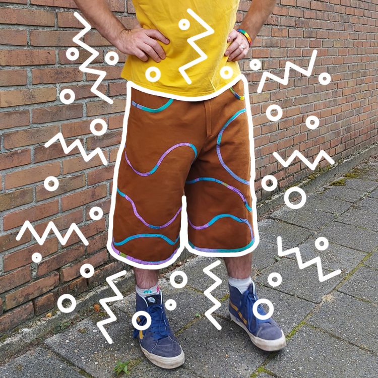 Brown shorts with colourful decorative details and deep pockets perfect for skaters