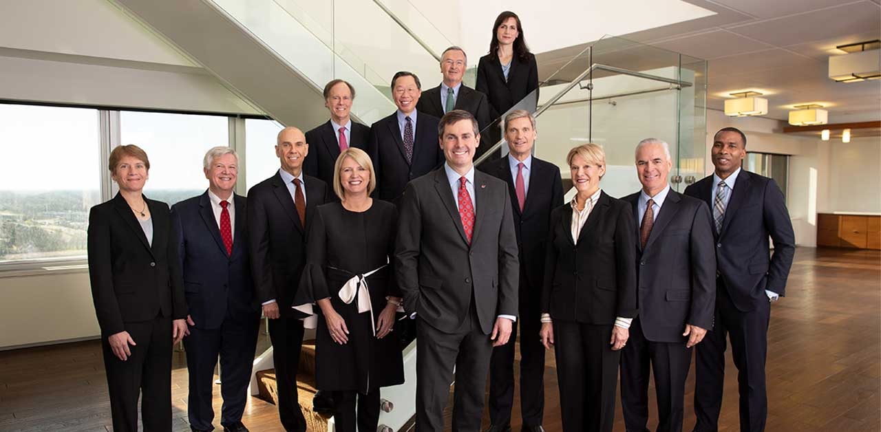 board of directors group shot in the steps