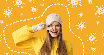 Frau genießt Wintersonne im Freien