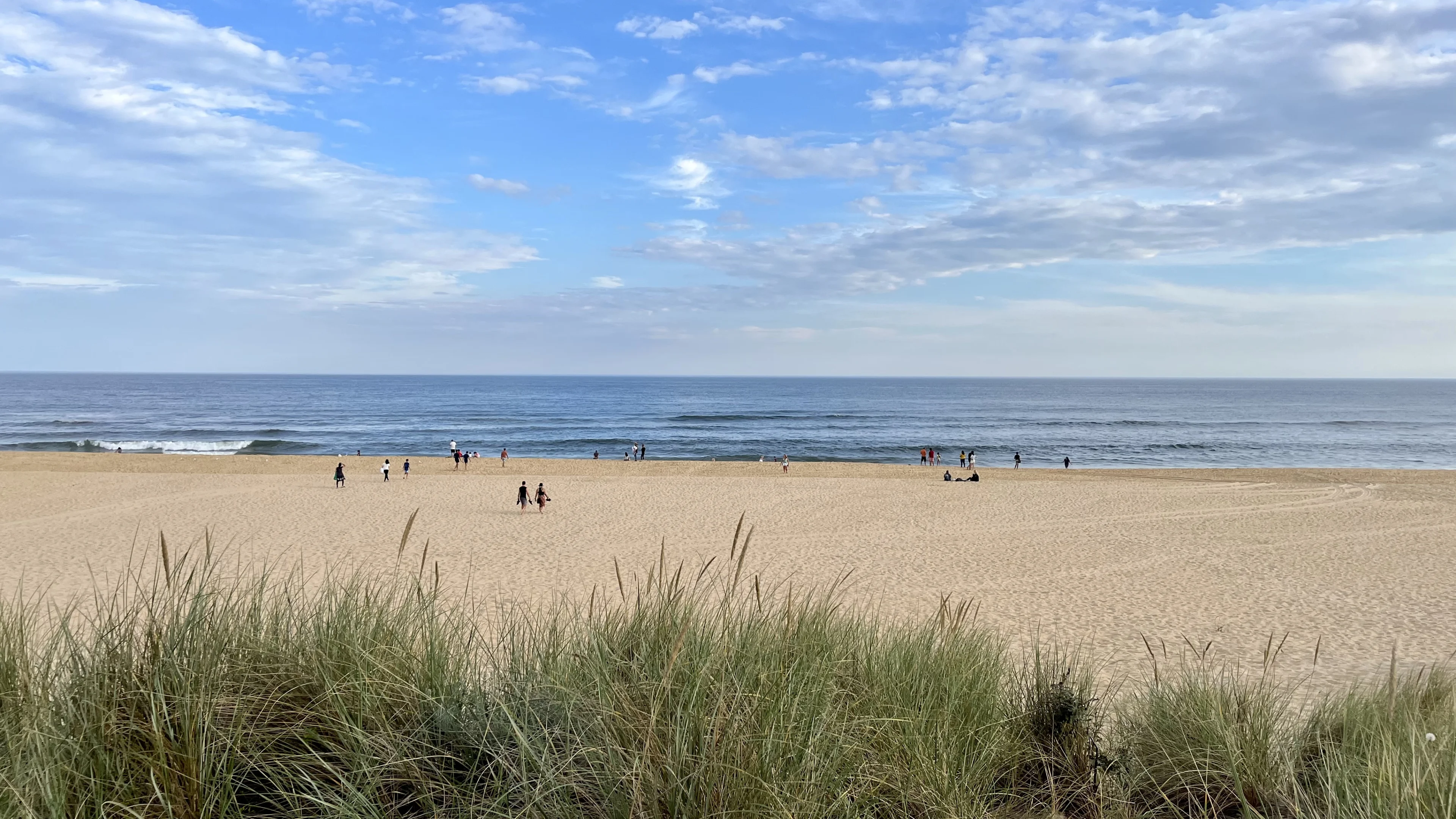 A view of the main beach at Lakes Entrance with blue skies.