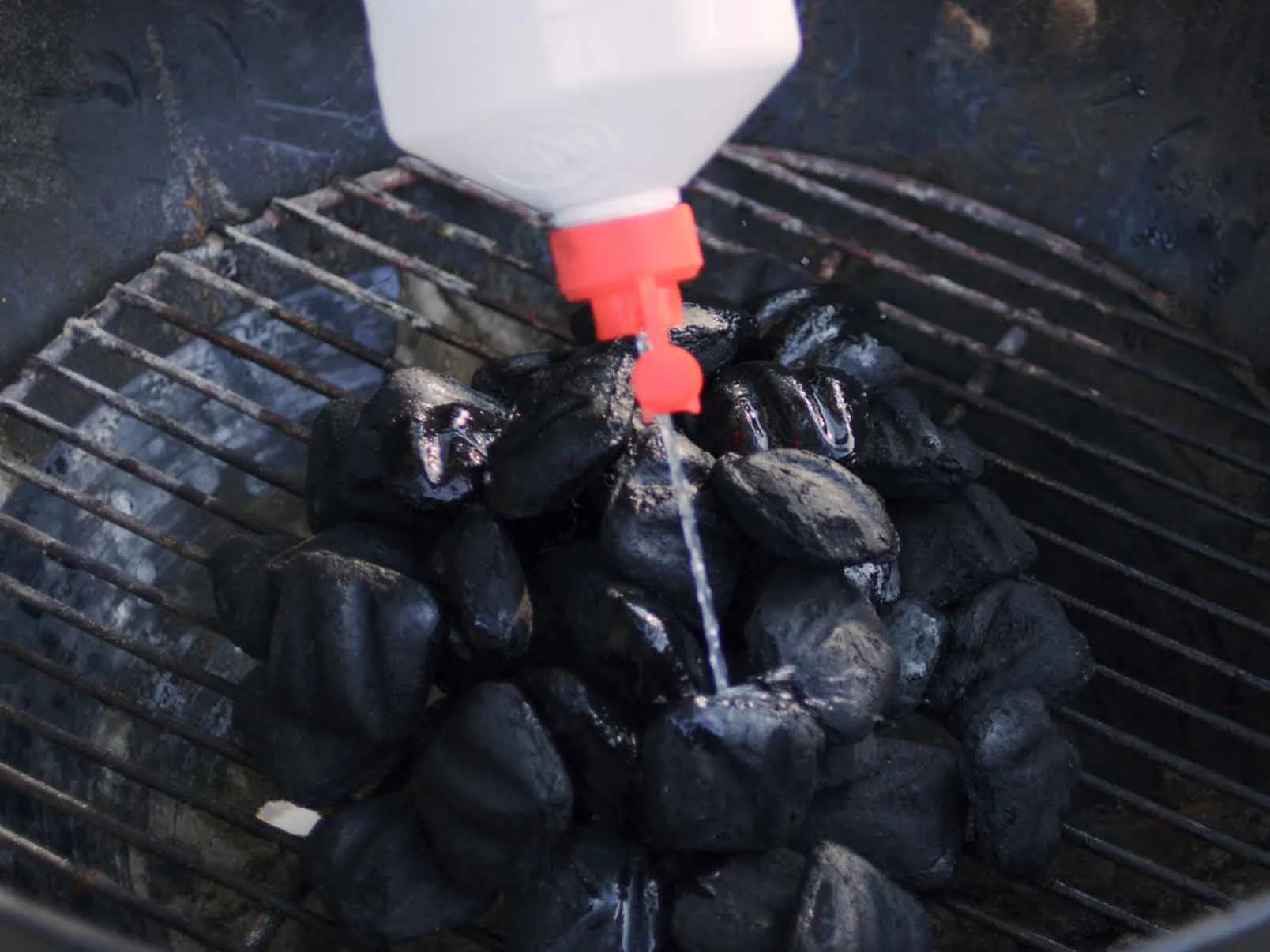How to Add the Lighter Fluid - textblock image 0 for how-to-light-charcoal-with-lighter-fluid