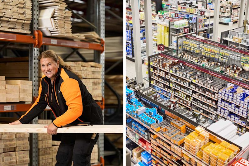 Arbetare i orange-svart jacka lyfter träplanka i byggvaruhall med hyllor fulla av skruvpaket.