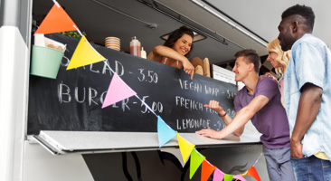 people ordering from a food truck
