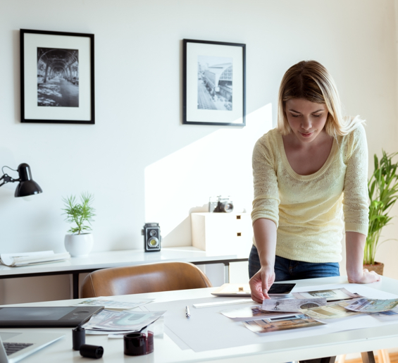 Image of woman at desk working on her portfolio