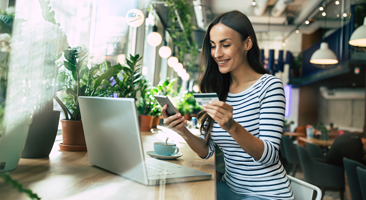 Women looking at her credit card