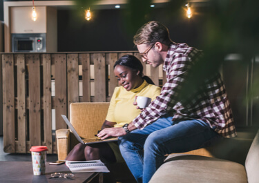 couple working on laptop