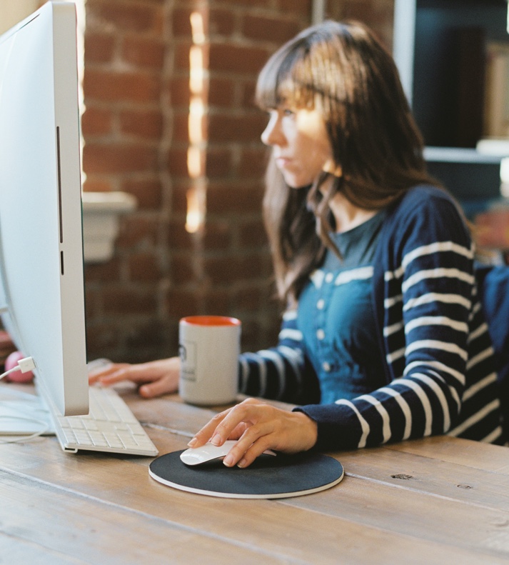 women working on her computer