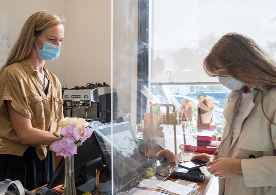women making a purchase