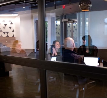 Constant Contact employees in a conference room.