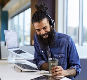 Constant Contact Marketing Advisor on the phone with a customer.