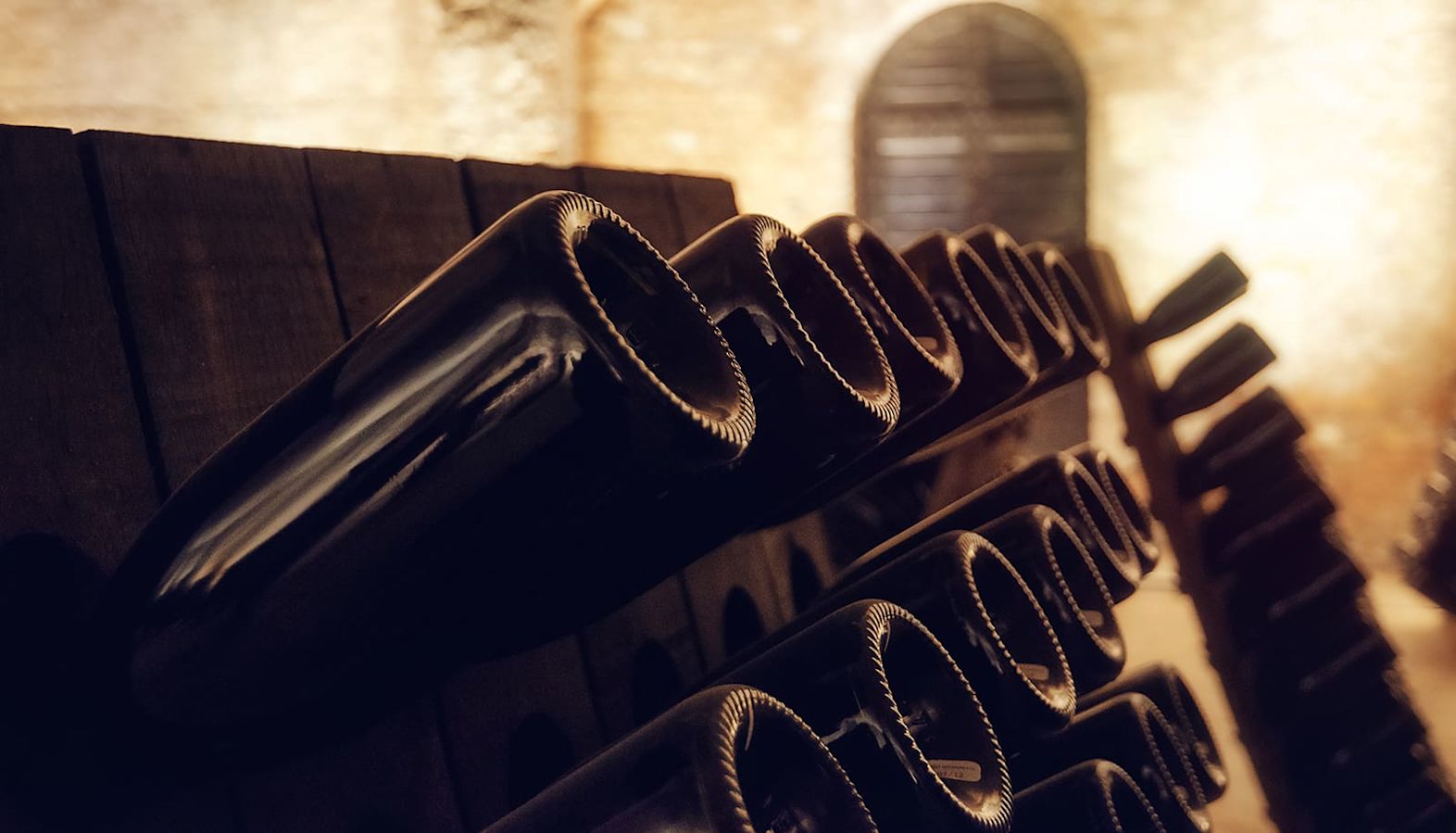 Champagne bottles in a wine cellar - how long does Champagne last