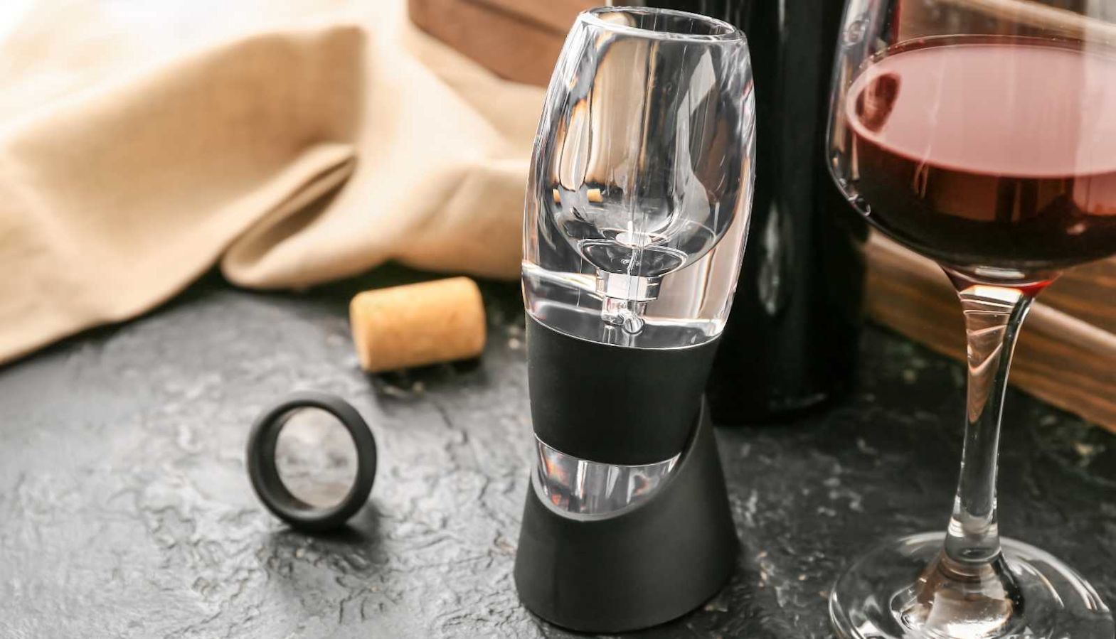 Wine aeration - a wine aerator on a table