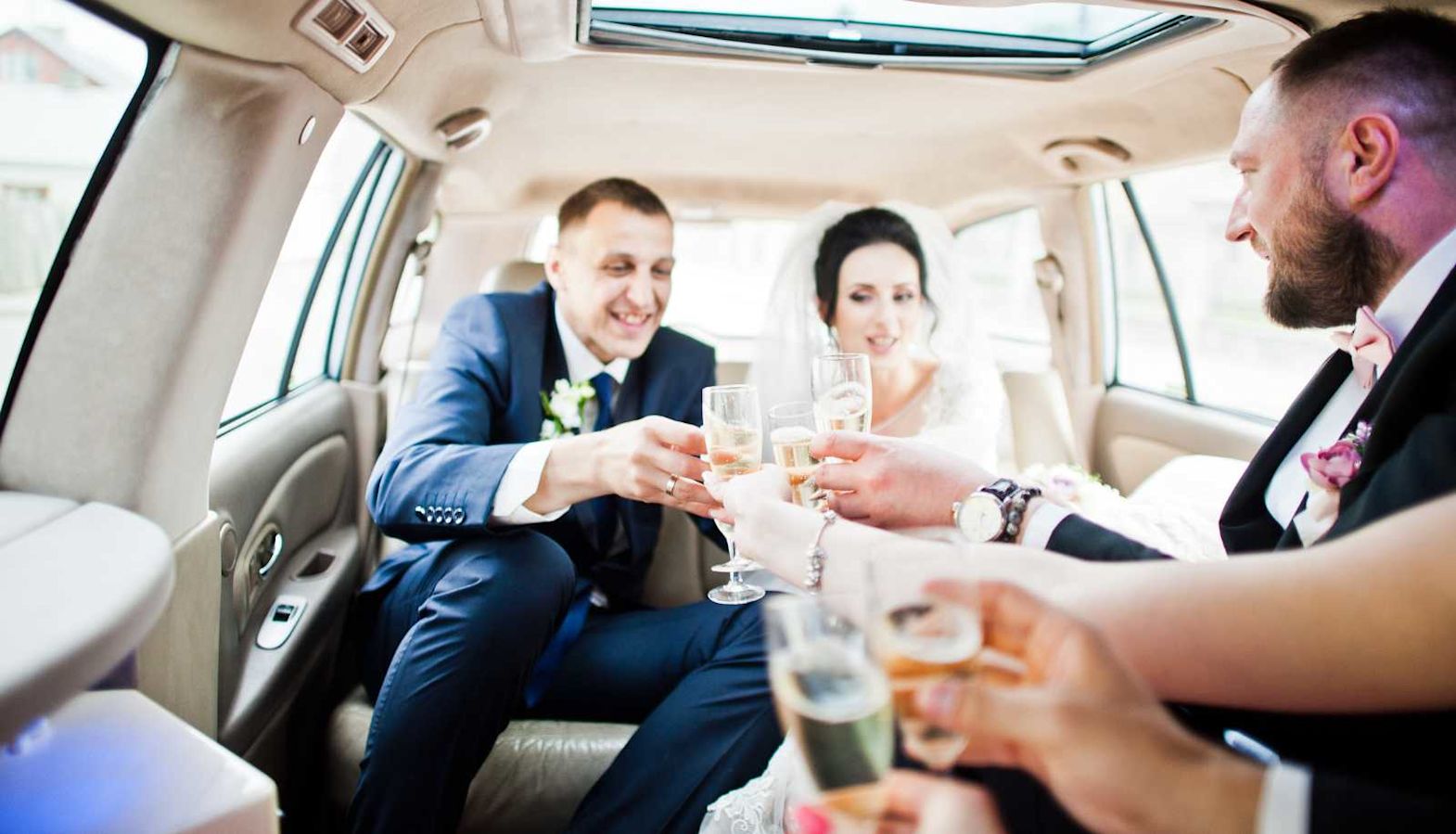Wedding wine – food pairing guide - just married in car champagne